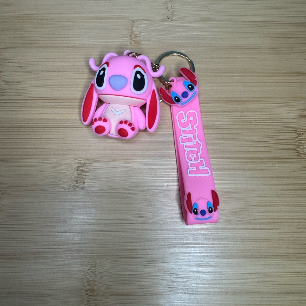 Angel from Stitch pink keychain nwot